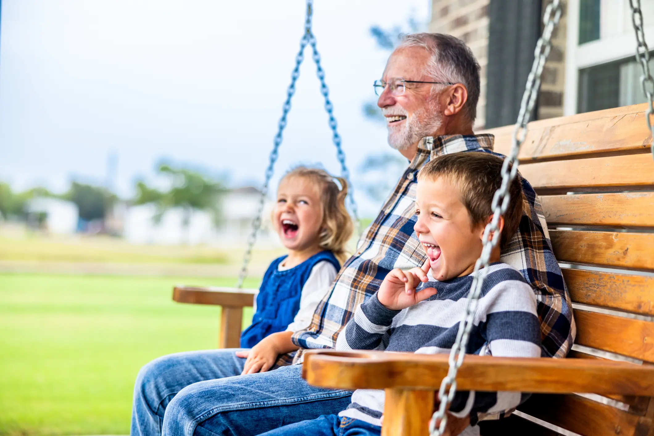 Fun story time with grandpa on the porch swing