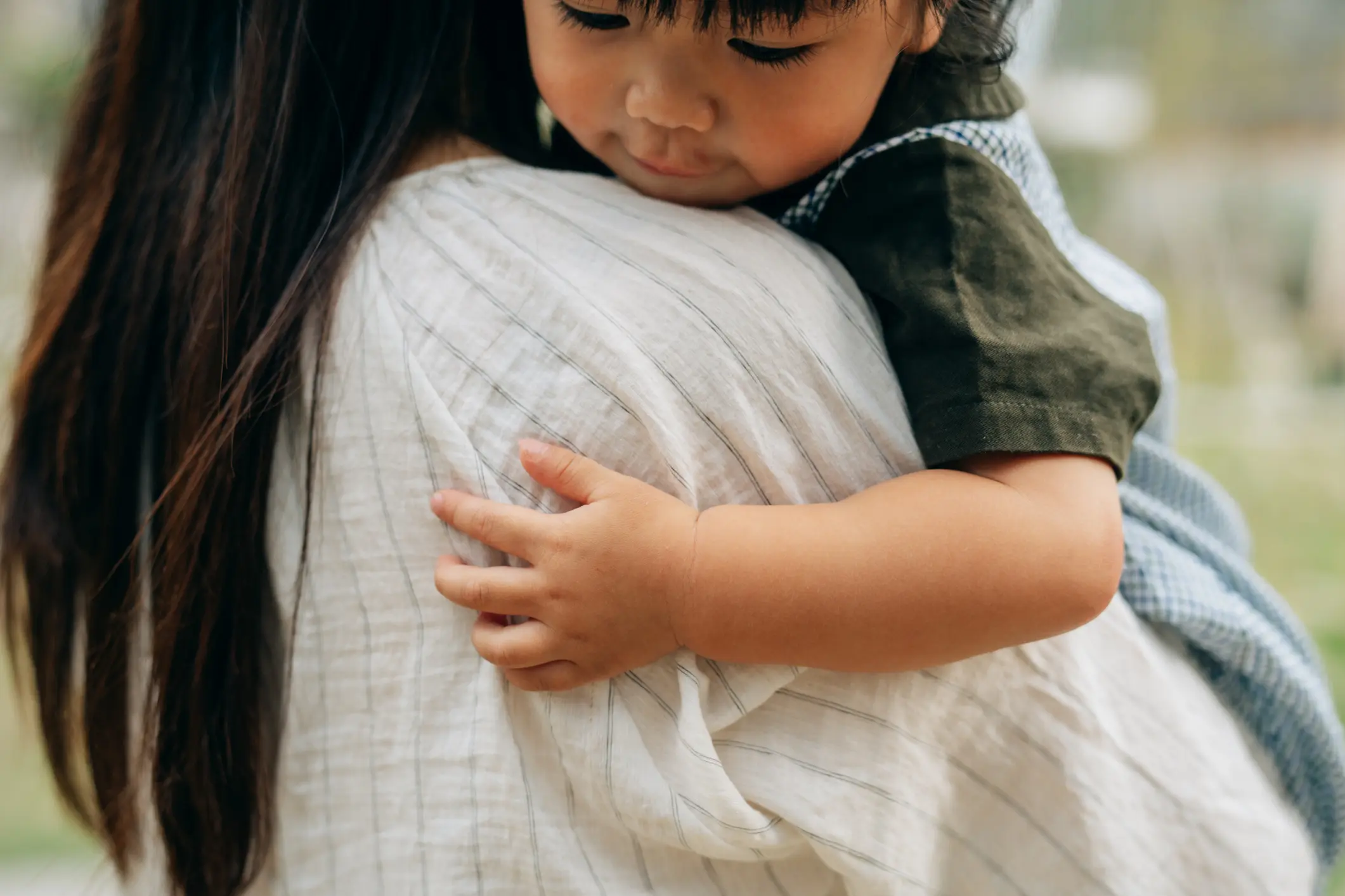 A Heartwarming Capture of Everyday Bliss: A Mother's Tender Embrace and a Child's Innocent Trust, A Beautiful Tale of Motherly Love Unfolding in the Simplicity of Daily Life Healthy Families America